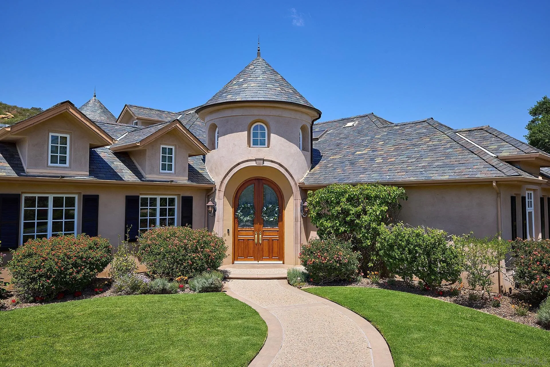 14460 Cheyenne Trail Poway, CA 92064 - Photo 16 of 74 a front view of a house with a yard