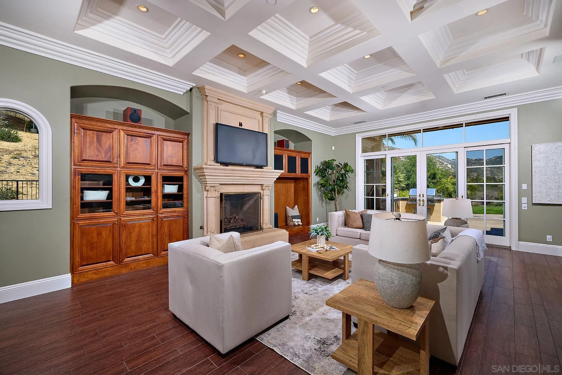 14460 Cheyenne Trail Poway, CA 92064 - Photo 22 of 74 a living room with furniture a fireplace and a large window