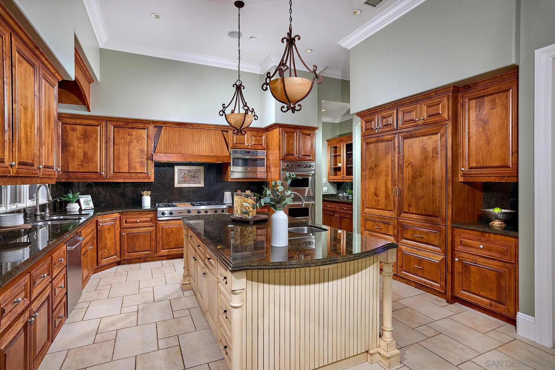 14460 Cheyenne Trail Poway, CA 92064 - Photo 26 of 74 a kitchen with stainless steel appliances granite countertop a stove and refrigerator
