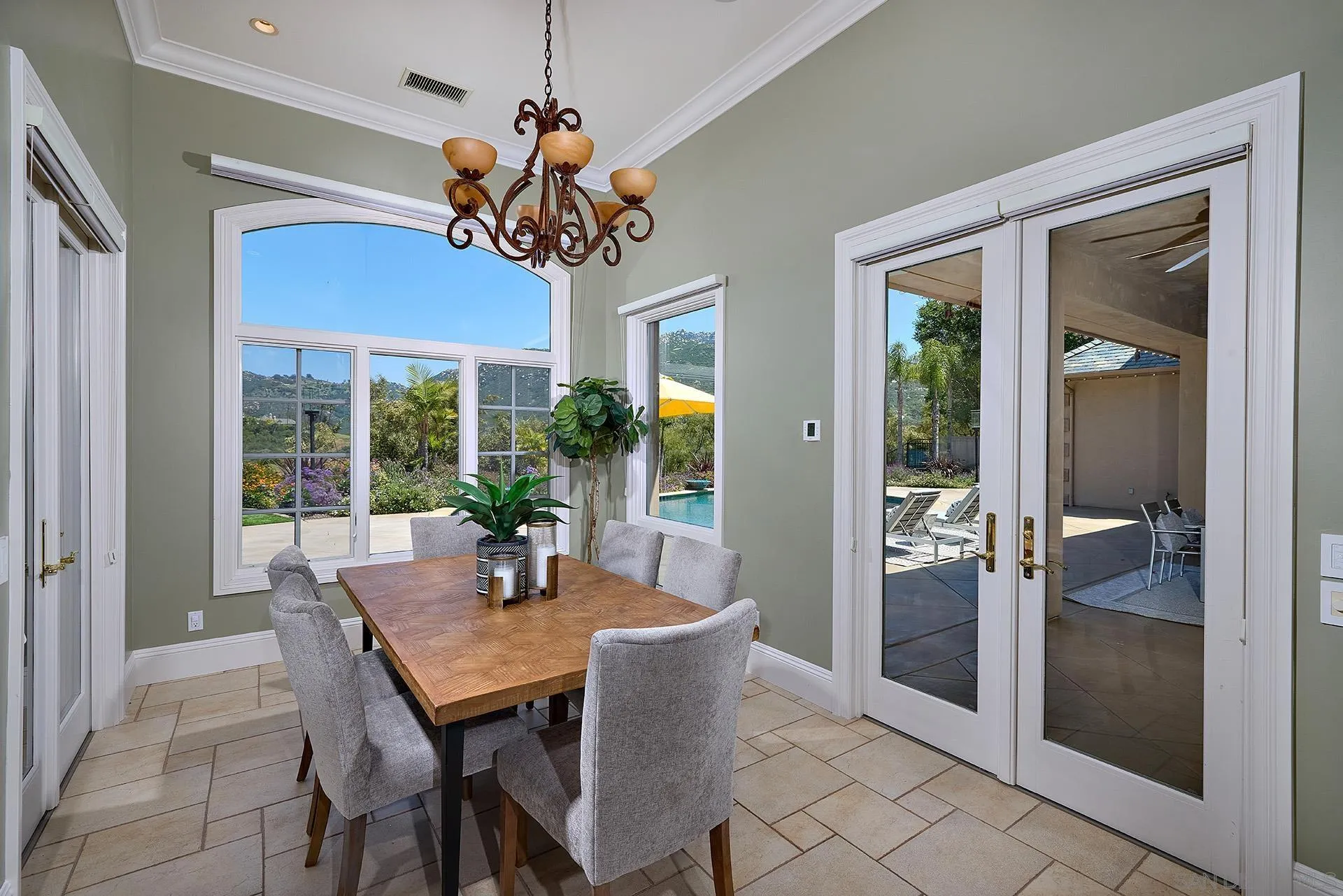 14460 Cheyenne Trail Poway, CA 92064 - Photo 28 of 74 a view of a dining room with furniture window and glass door