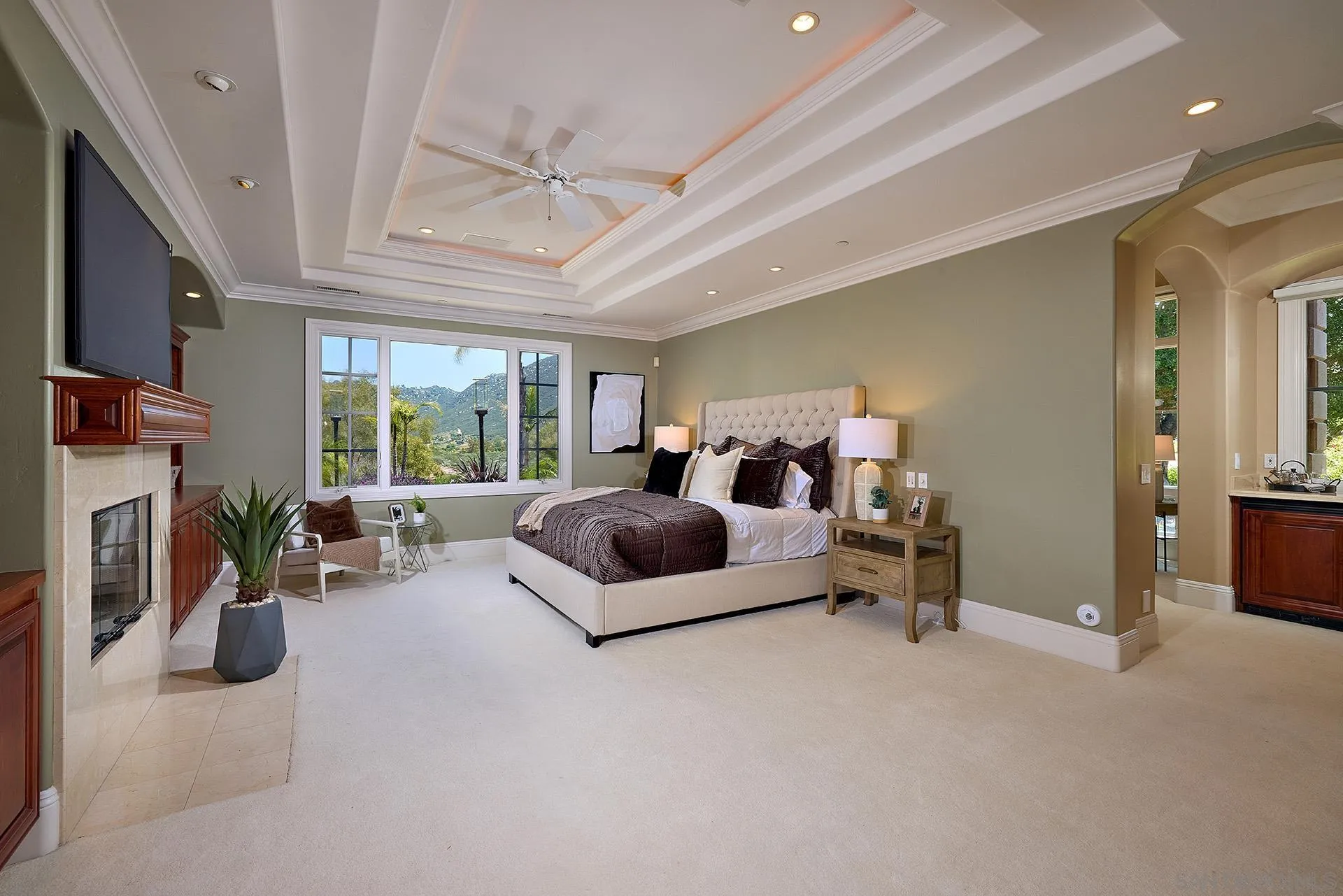 14460 Cheyenne Trail Poway, CA 92064 - Photo 31 of 74 a living room with furniture large window and a fireplace