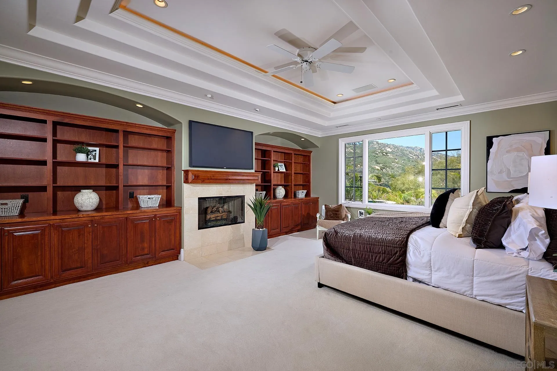 14460 Cheyenne Trail Poway, CA 92064 - Photo 32 of 74 a living room with furniture and a fireplace
