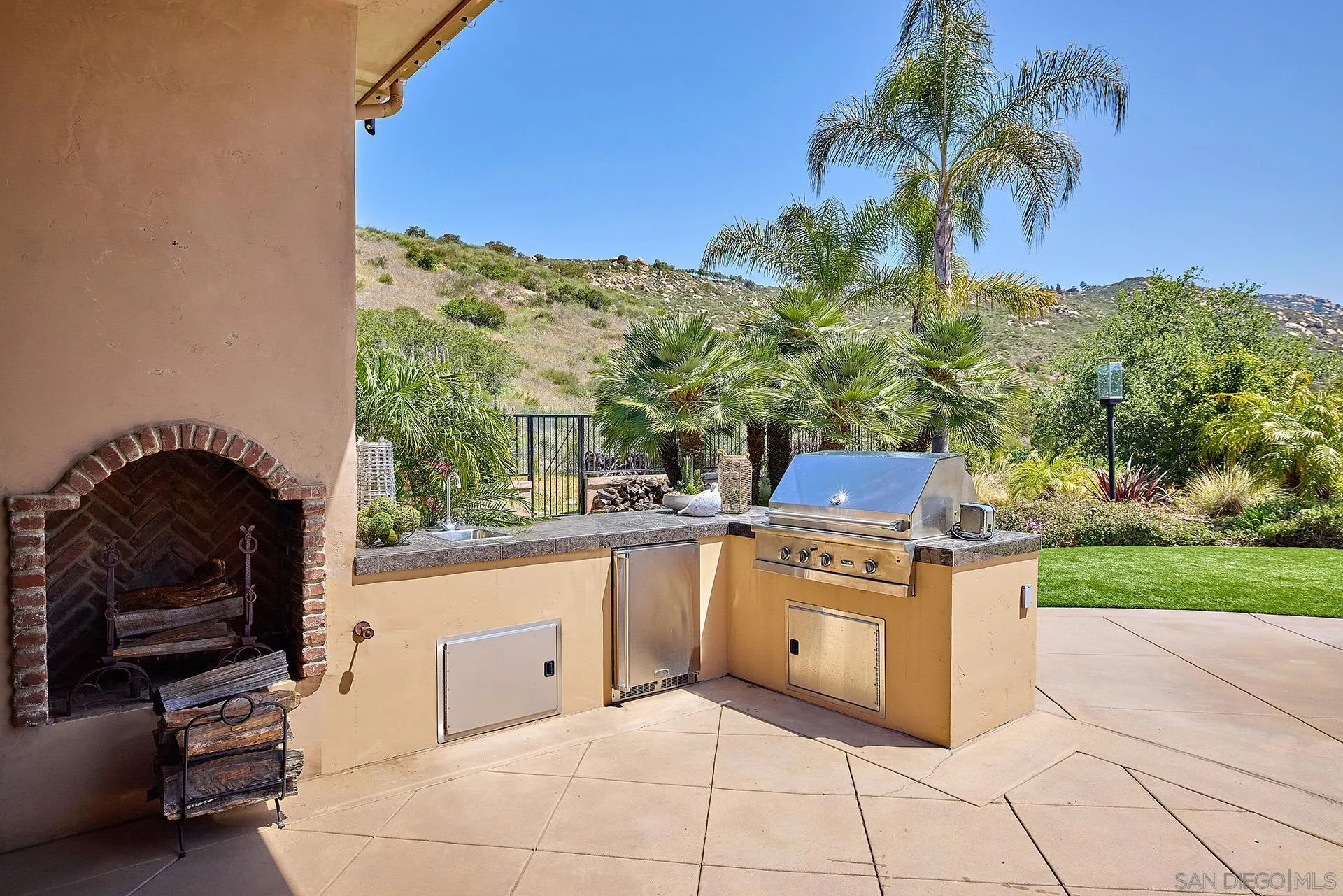 14460 Cheyenne Trail Poway, CA 92064 - Photo 46 of 74 a view of a terrace with a garden and mountain view
