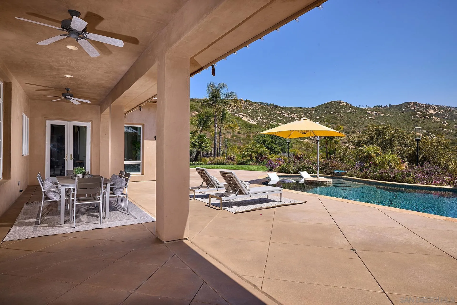 14460 Cheyenne Trail Poway, CA 92064 - Photo 47 of 74 a view of a patio with couches table and chairs
