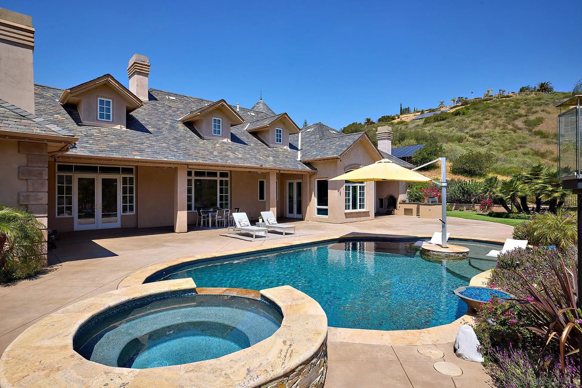 14460 Cheyenne Trail Poway, CA 92064 - Photo 52 of 74 a view of house with swimming pool outdoor seating