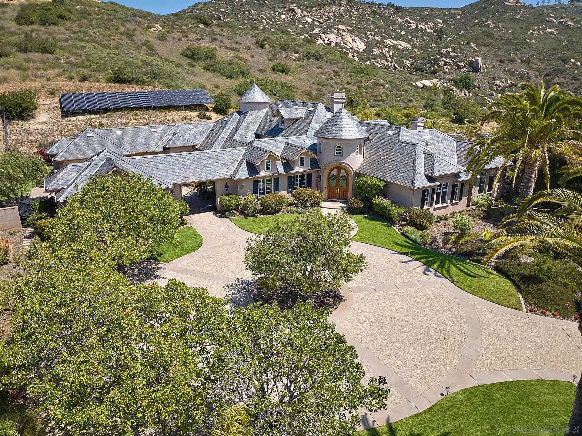 14460 Cheyenne Trail Poway, CA 92064 - Photo 55 of 74 an aerial view of a house with a garden and plants