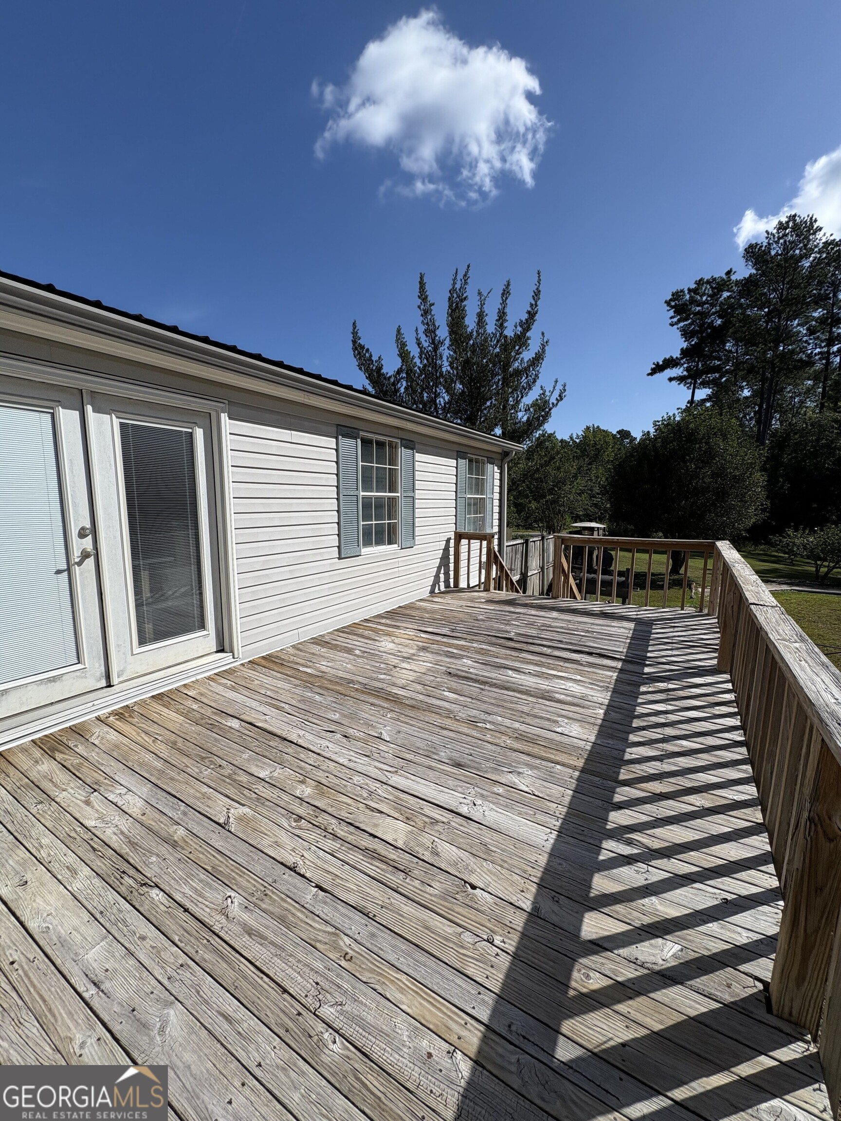 314 Cedar Creek Road Harrison, GA 31035 - Photo 17 of 20 a view of a house with entertaining space