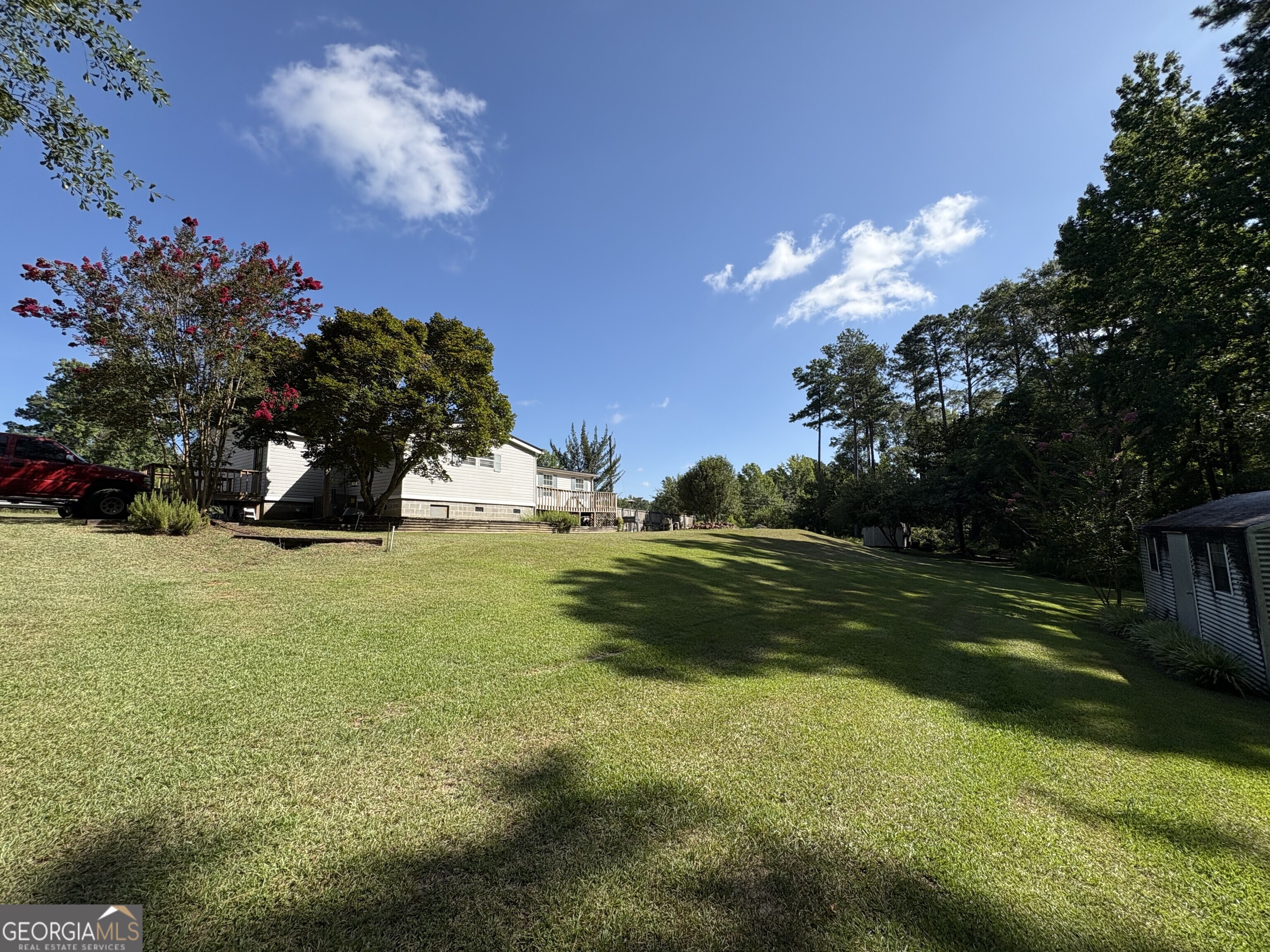 314 Cedar Creek Road Harrison, GA 31035 - Photo 20 of 20 a view of a golf course with a house