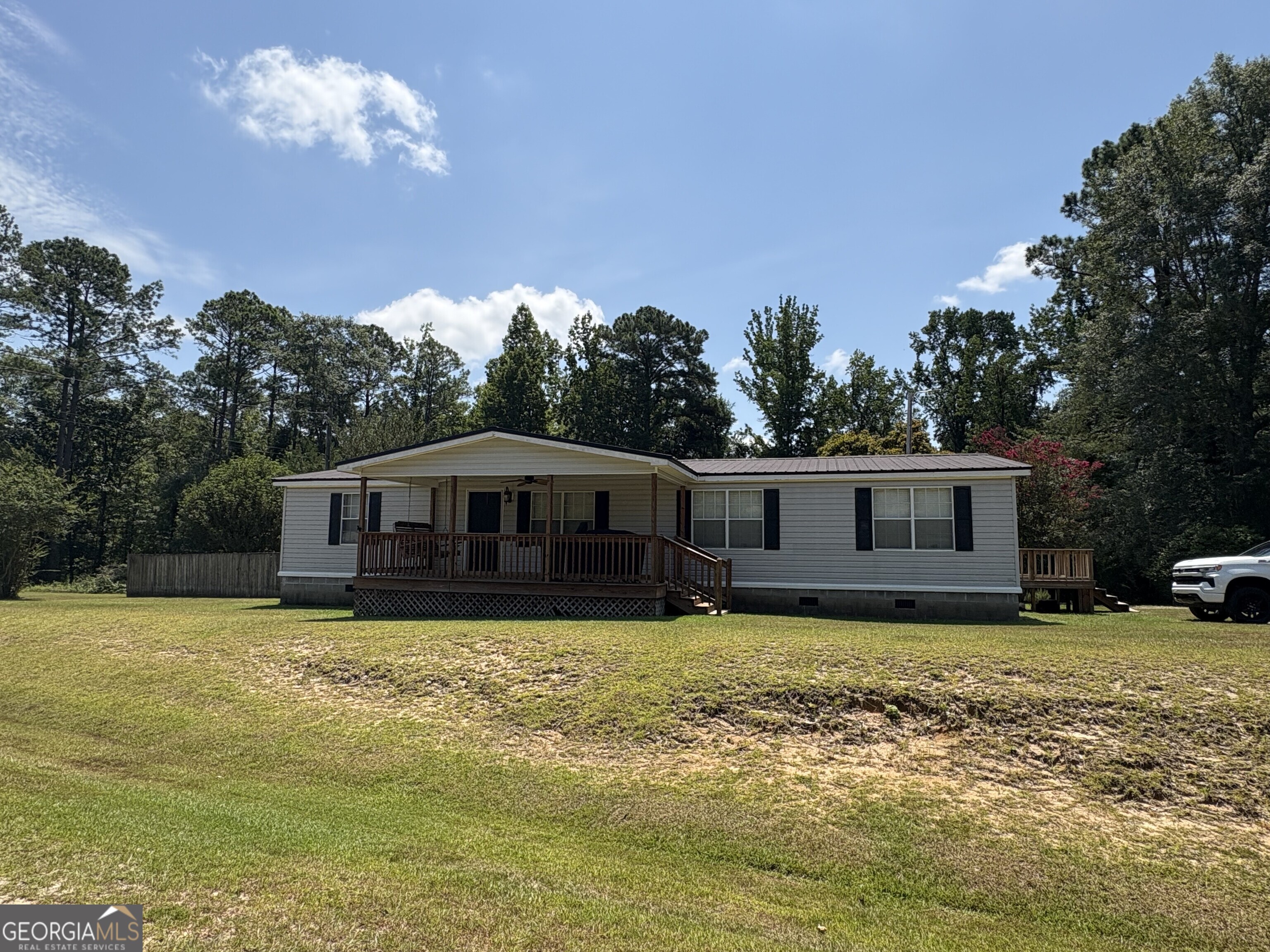 314 Cedar Creek Road Harrison, GA 31035 - Photo 3 of 20 a view of a house with a yard