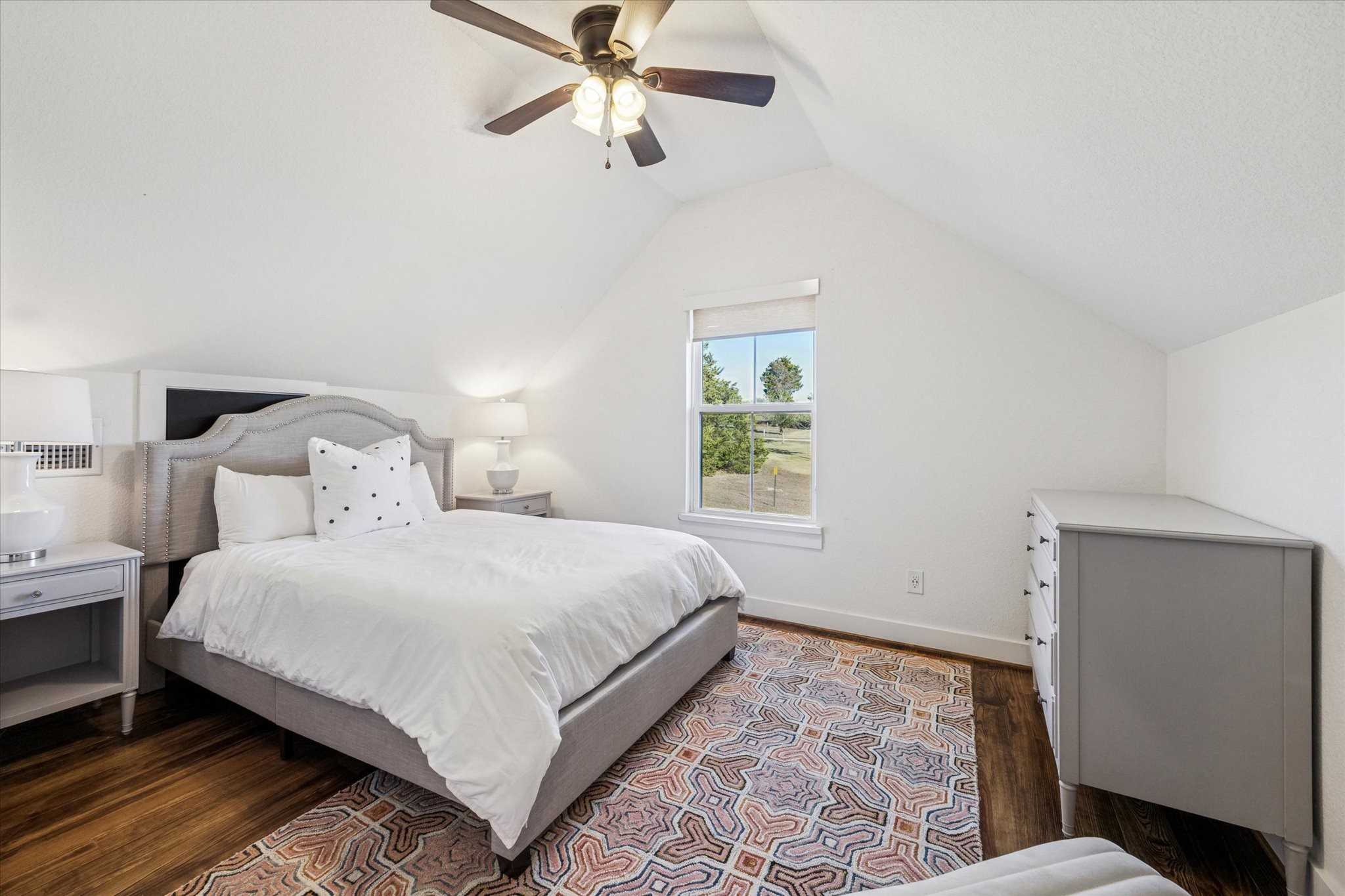 124 REBEKAHS Crossing Round Top, TX 78954 - Photo 16 of 25 a bedroom with a large bed and a window