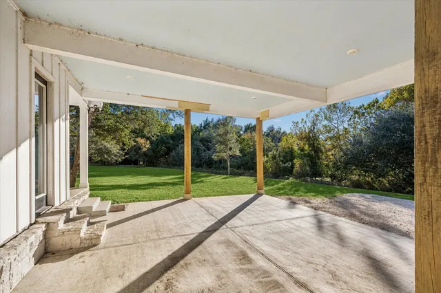 a view of backyard with green space