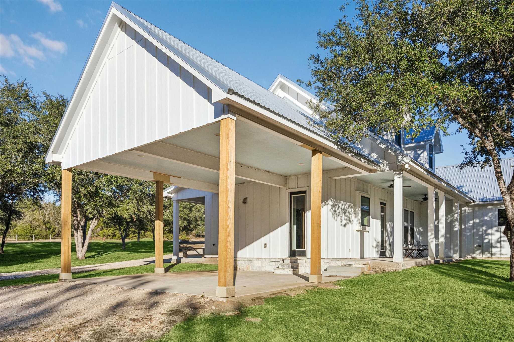124 REBEKAHS Crossing Round Top, TX 78954 - Photo 21 of 25 a view of a house with a yard and plants