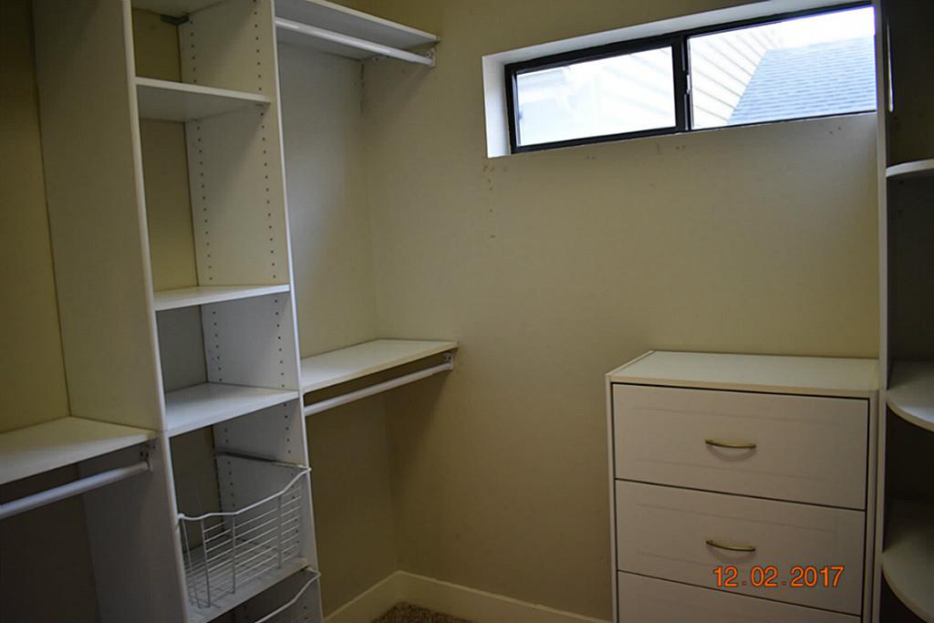 4338 Spencer Street Houston, TX 77007 - Photo 11 of 23 Organization system in master closet