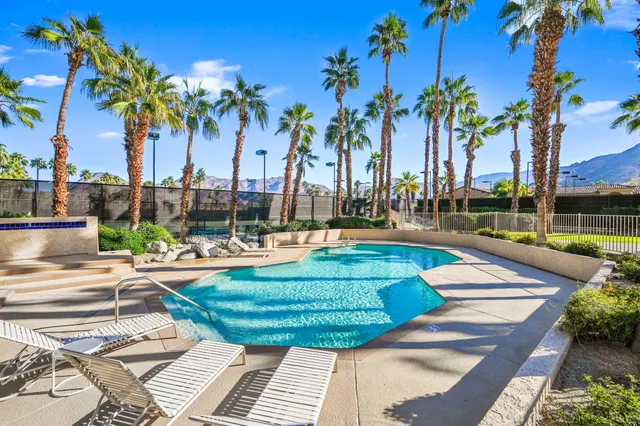 a view of an outdoor space and tennis court