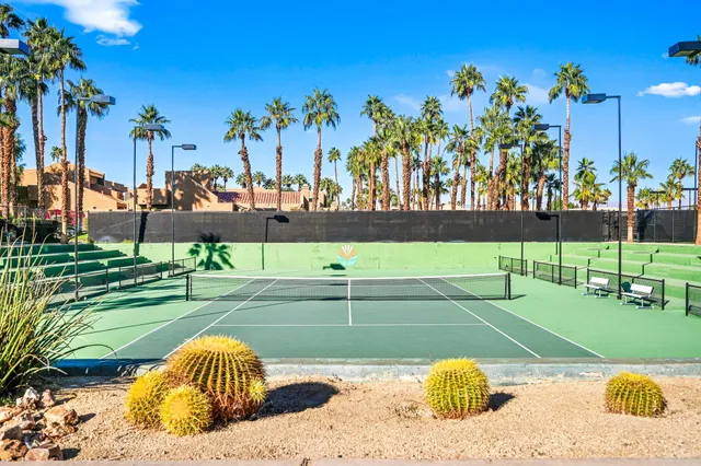 a view of a playground with a big yard