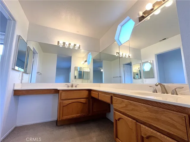 a white toilet sitting next to a bath tub and shower