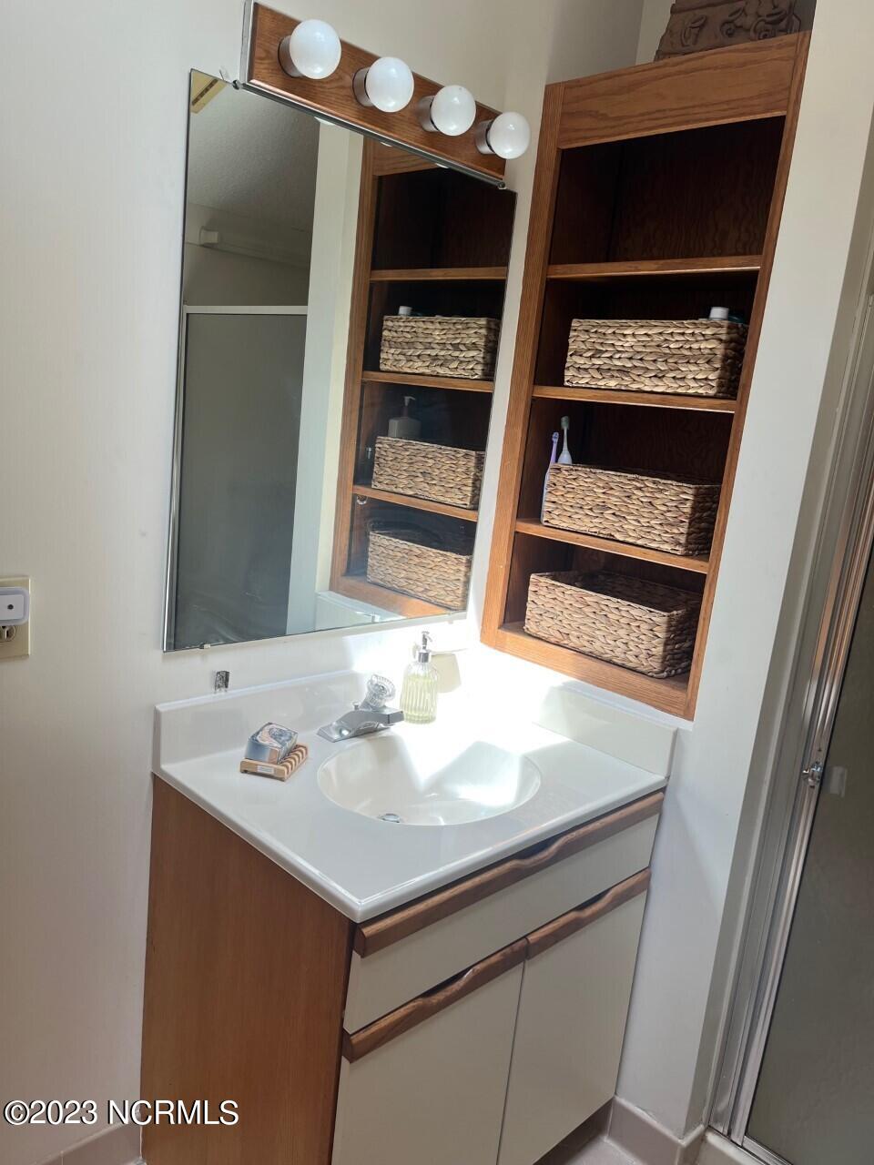 402 Ravenswood Road Hampstead, NC 28443 - Photo 68 of 130 Primary Bathroom 2