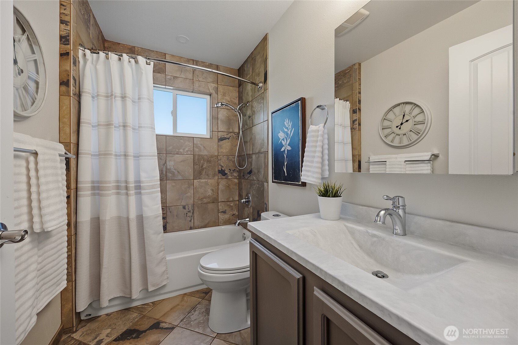 23707 Meridian Place West Bothell, WA 98021 - Photo 24 of 40 a bathroom with a sink toilet and shower