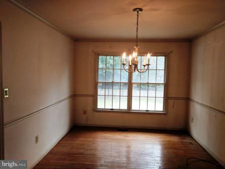 8023 Clark Station Road Severn, MD 21144 - Photo 4 of 21 Dining Room with Hardwood Floors