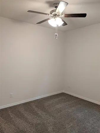 a view of a small space with a fan