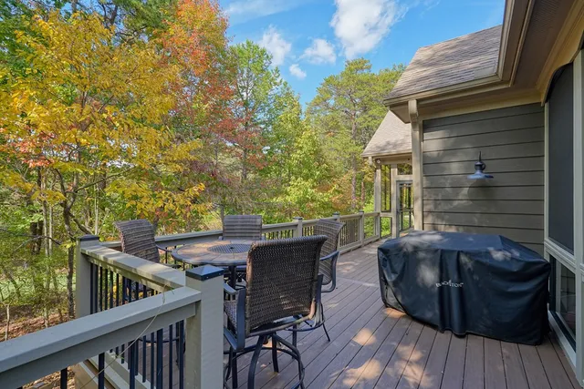 a bedroom with furniture and a ceiling fan