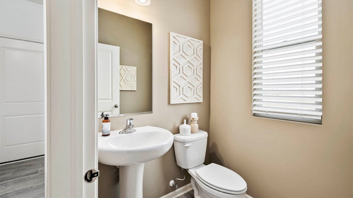9977 Edgebrook Lane Huntley, IL 60142 - Photo 8 of 26 a bathroom with a sink a toilet and a mirror
