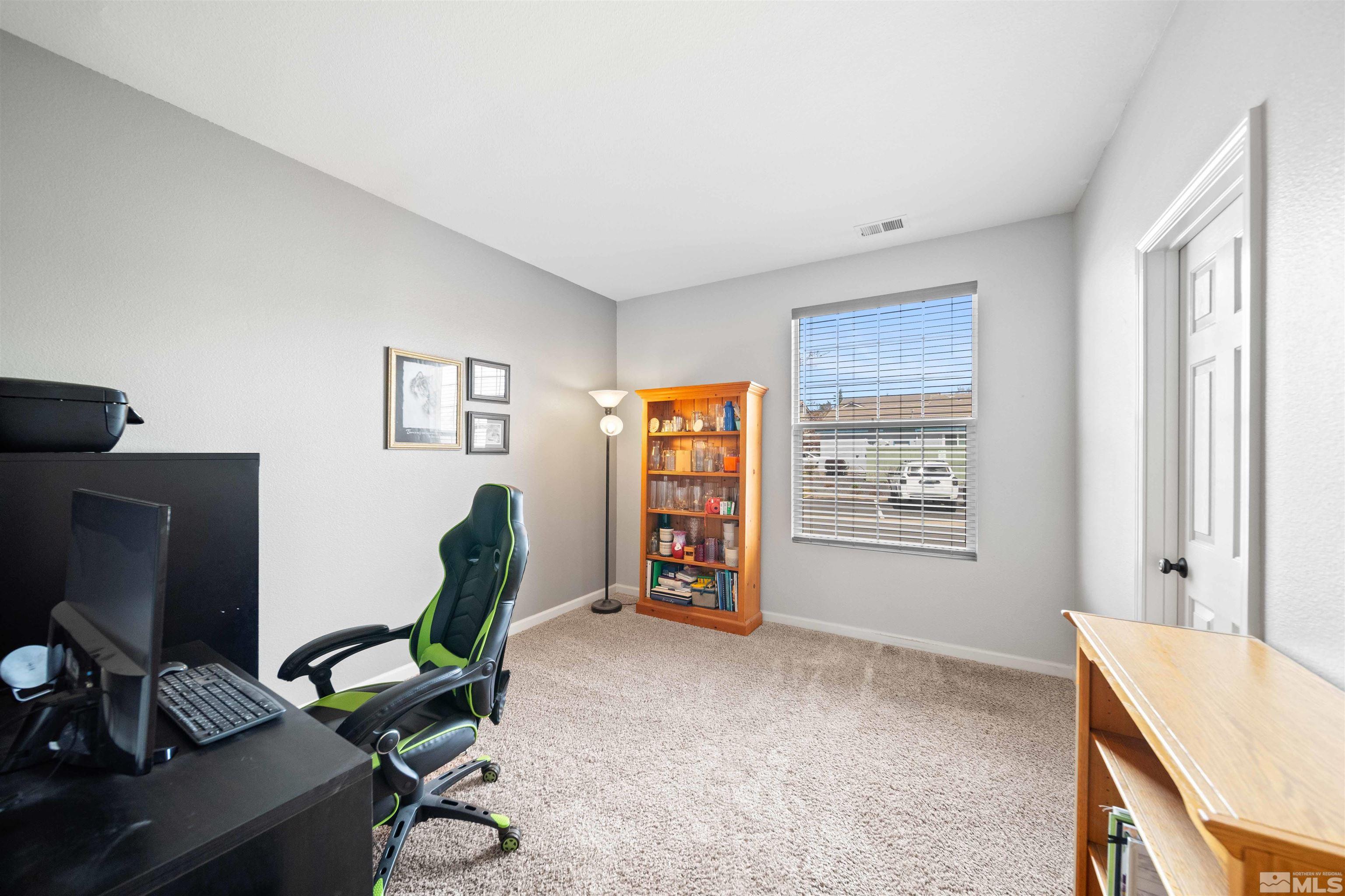 10599 Iron Point Circle Reno, NV 89521 - Photo 21 of 39 a workspace with furniture and a window