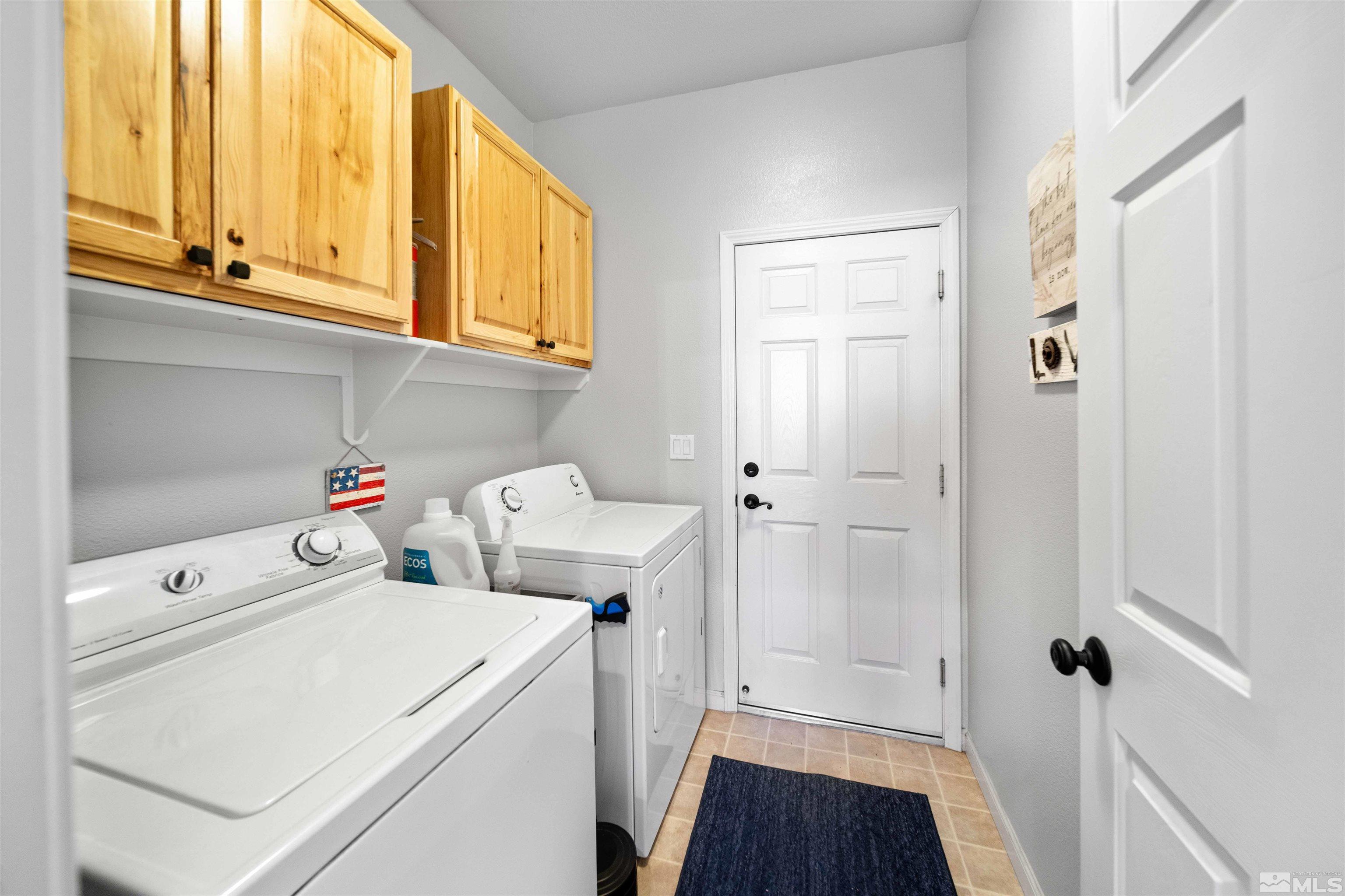 10599 Iron Point Circle Reno, NV 89521 - Photo 25 of 39 a view of utility room with washer and dryer