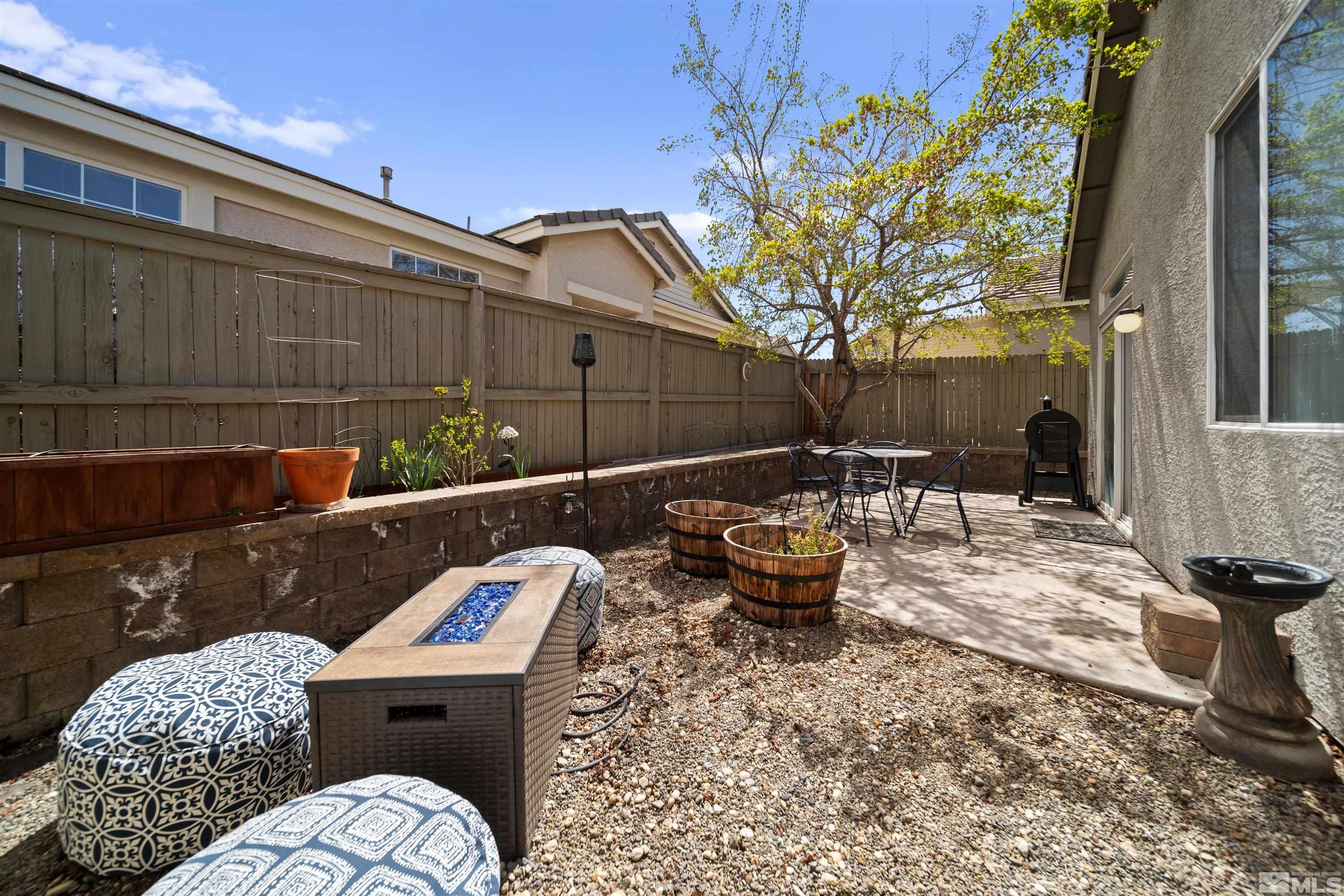 10599 Iron Point Circle Reno, NV 89521 - Photo 28 of 39 a outdoor space with patio couch and chairs
