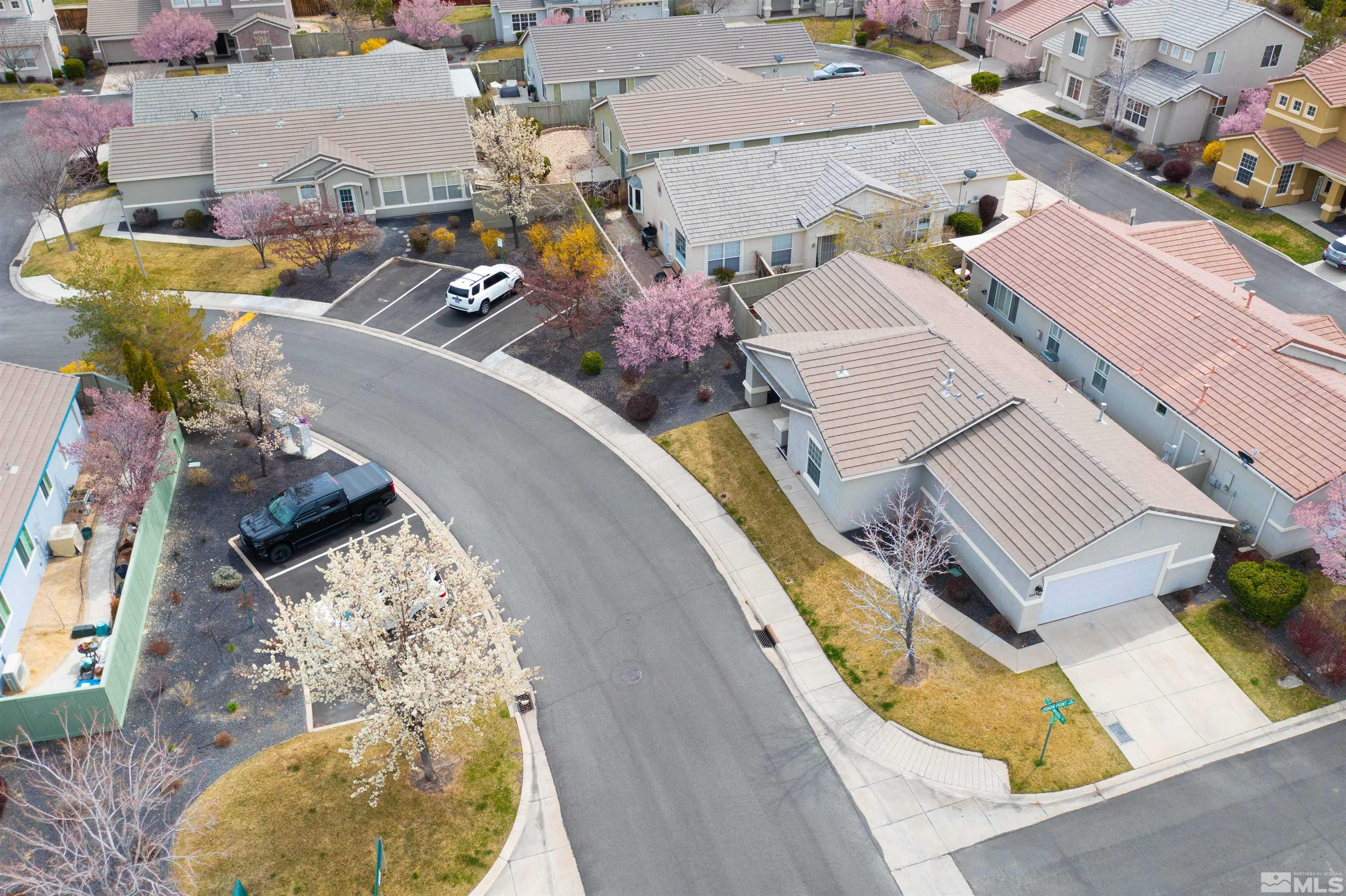 10599 Iron Point Circle Reno, NV 89521 - Photo 33 of 39 an aerial view of a house with swimming pool