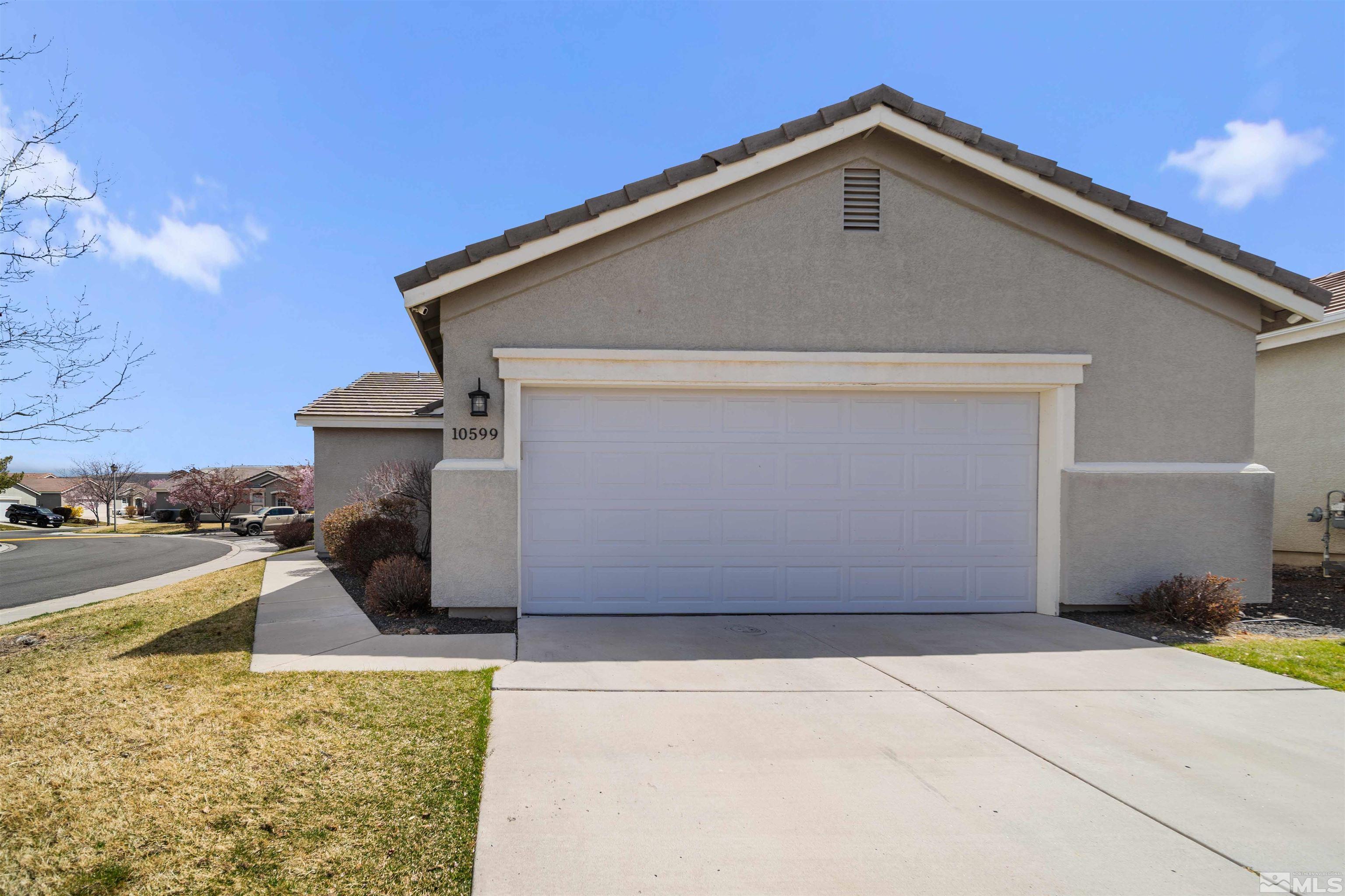 10599 Iron Point Circle Reno, NV 89521 - Photo 4 of 39 a house view with a outdoor space