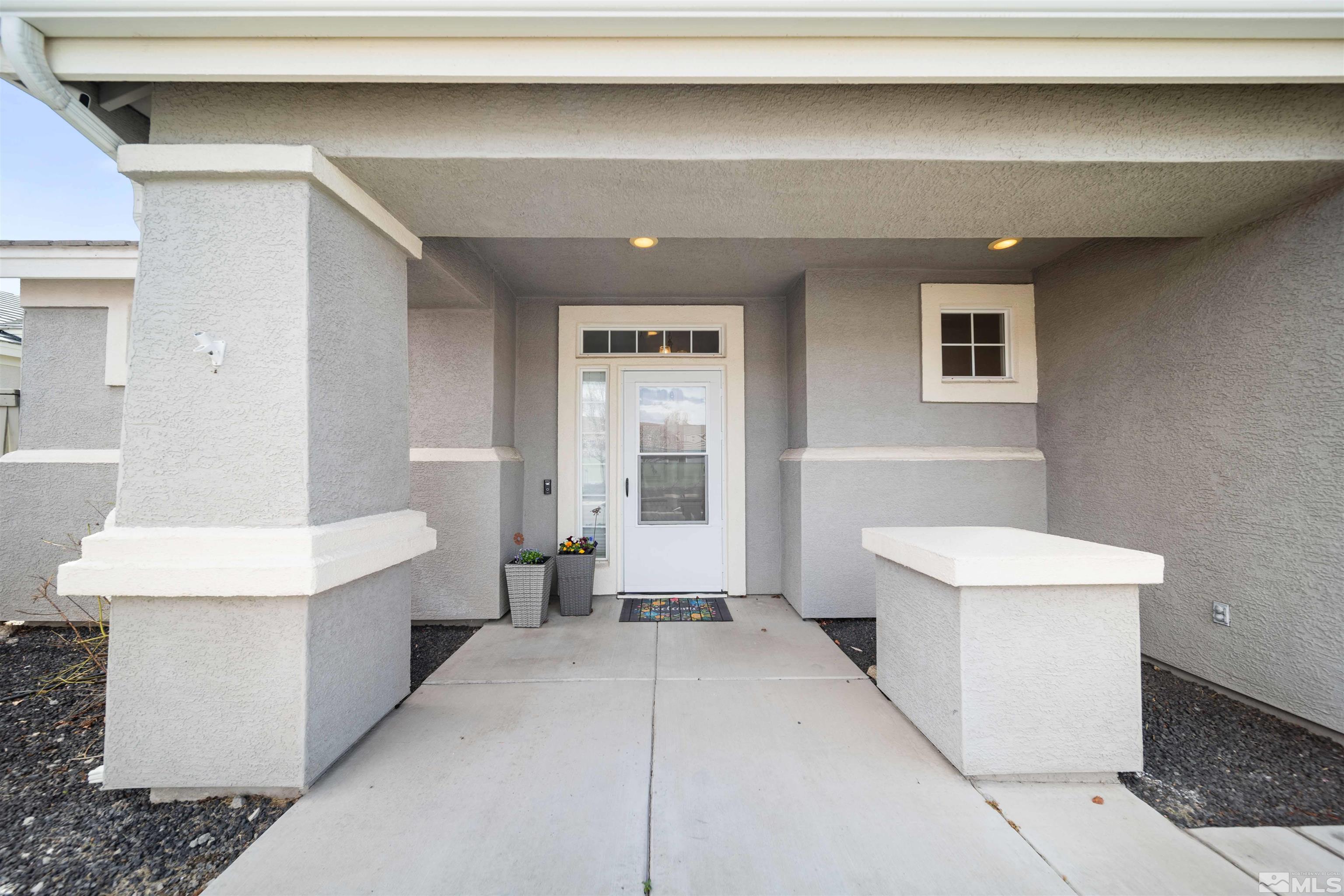 10599 Iron Point Circle Reno, NV 89521 - Photo 5 of 39 a bathroom with a sink a toilet and bathtub
