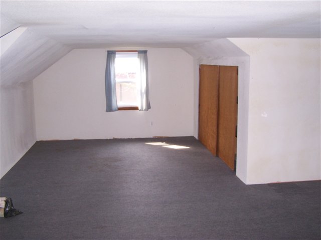 1287 North Markel Road Ridott, IL 61067 - Photo 4 of 9 an empty room with a window