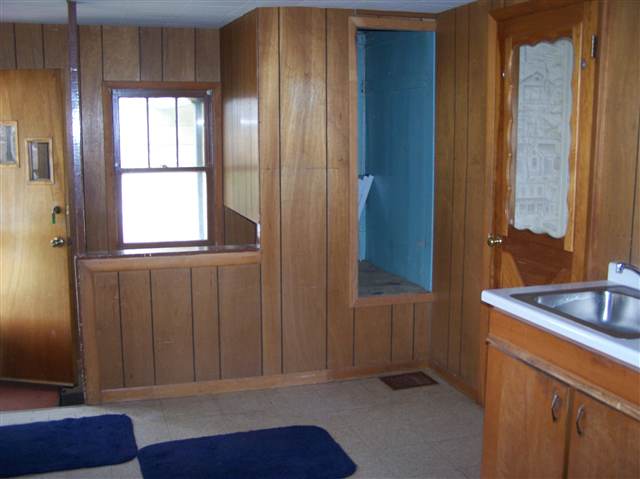 1287 North Markel Road Ridott, IL 61067 - Photo 6 of 9 a bathroom with a sink and a mirror