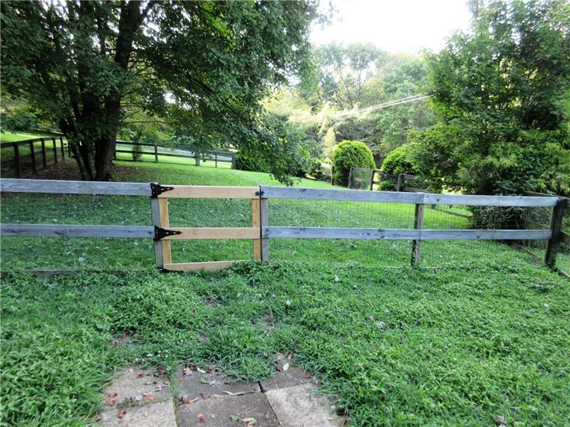 242 Boyd Road Freeport, PA 16229 - Photo 23 of 25 Great, large fenced in area for your pets, located just off of the covered deck.
