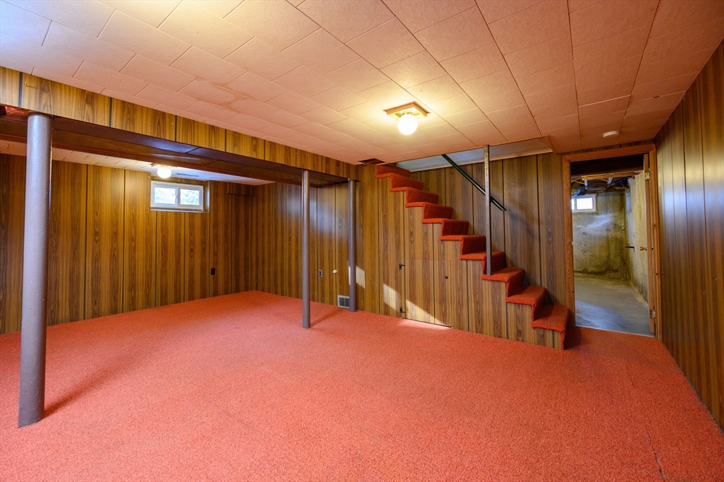 15 Autumn Circle Hingham, MA 02043 - Photo 26 of 38 a view of empty room with wooden walls