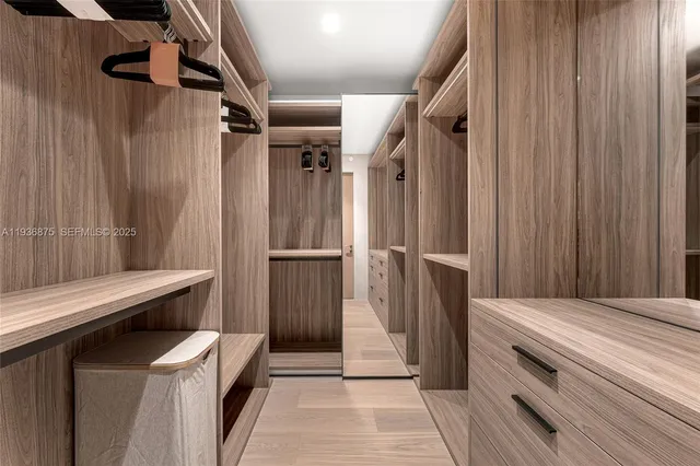 a bathroom with a shower and a sink