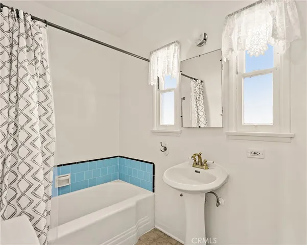 a bathroom with a sink and a bathtub