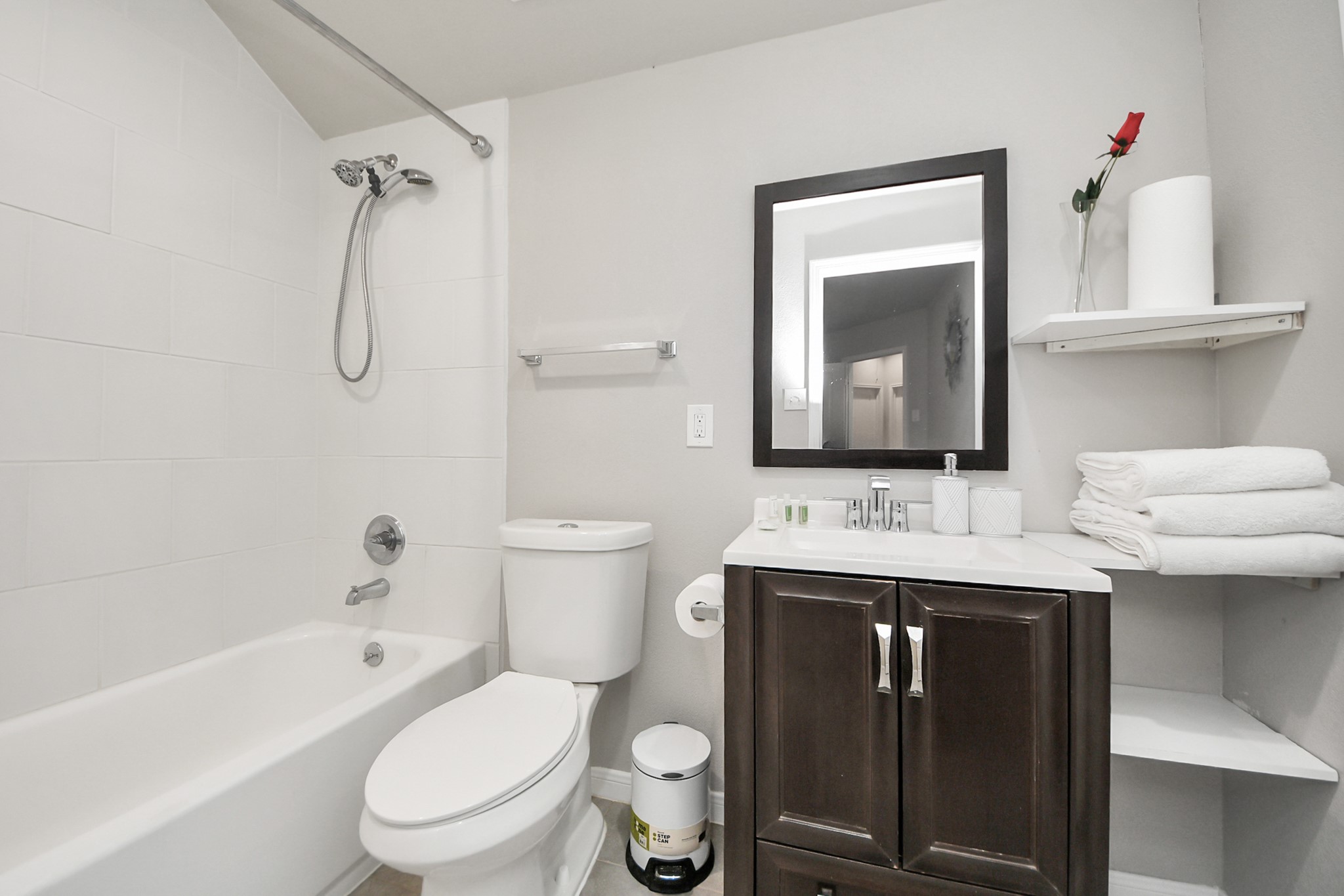3514 Windham Way Katy, TX 77494 - Photo 17 of 42 a bathroom with a toilet sink vanity tub and mirror
