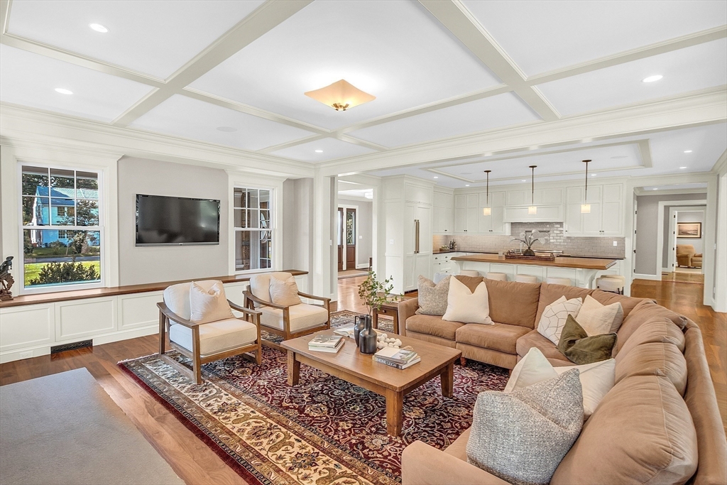 247 Independence Road Concord, MA 01742 - Photo 16 of 42 a living room with furniture and a flat screen tv