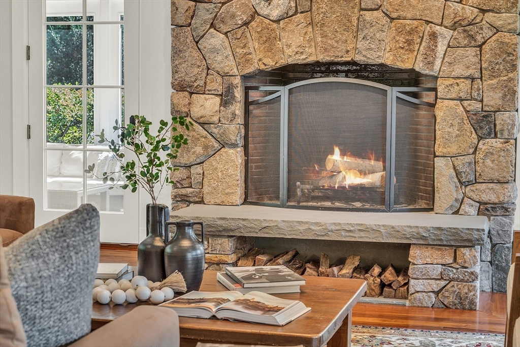 247 Independence Road Concord, MA 01742 - Photo 18 of 42 a living room with furniture and a potted plant