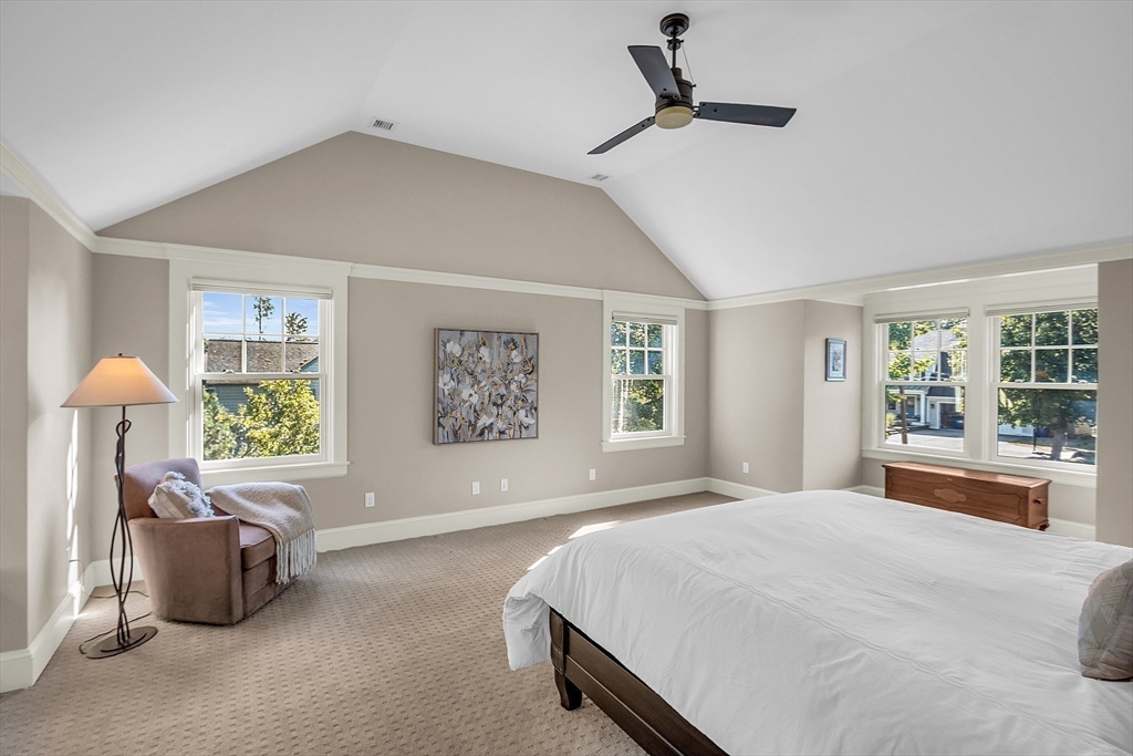 247 Independence Road Concord, MA 01742 - Photo 27 of 42 a spacious bedroom with a bed and a window