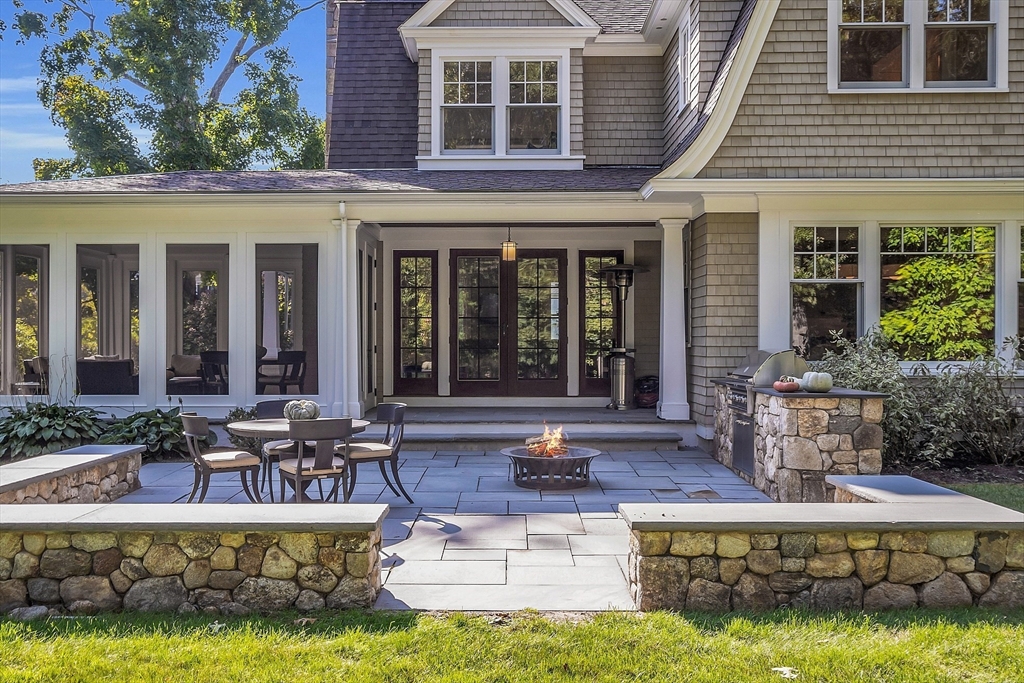 247 Independence Road Concord, MA 01742 - Photo 4 of 42 front view of a building with a fountain