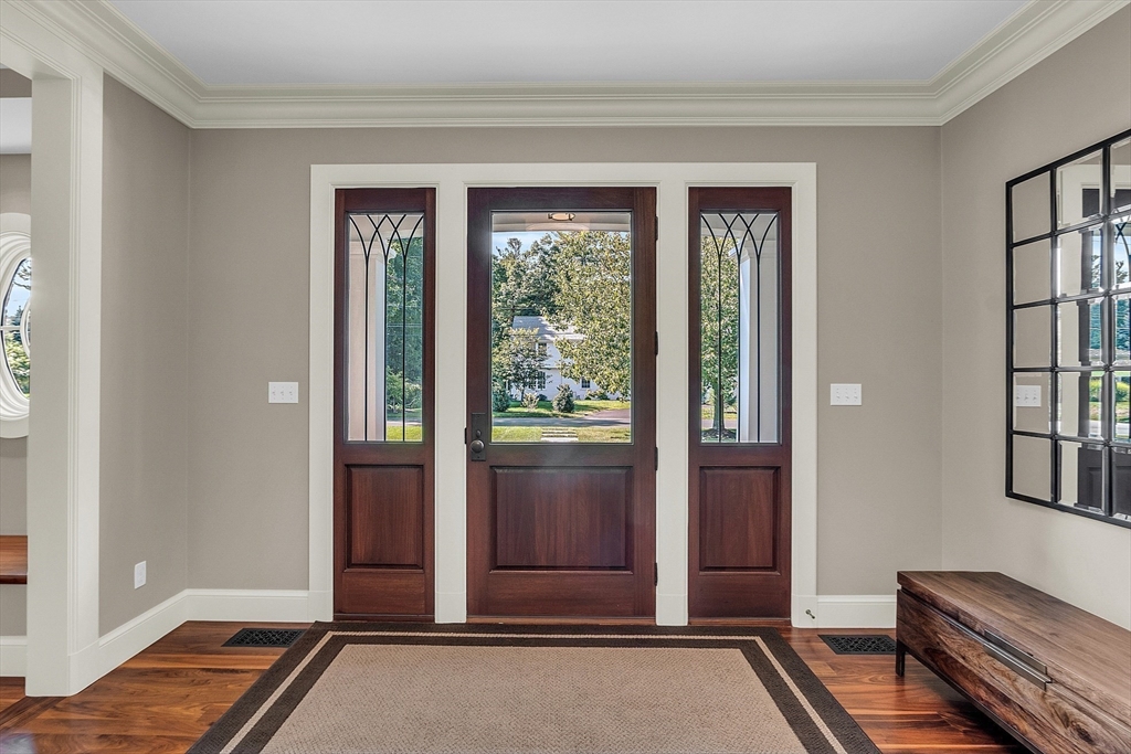 247 Independence Road Concord, MA 01742 - Photo 6 of 42 a view of livingroom with furniture and windows