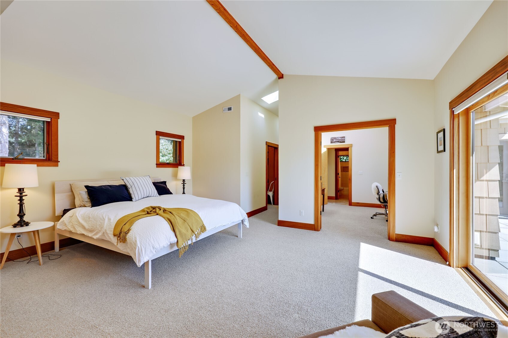 7870 Northeast Koura Farm Drive Bainbridge Island, WA 98110 - Photo 23 of 39 a bedroom with bed and a large window