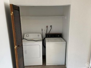 590 Pilot Avenue Wendover, UT 84083 - Photo 8 of 20 Laundry room featuring washing machine and dryer