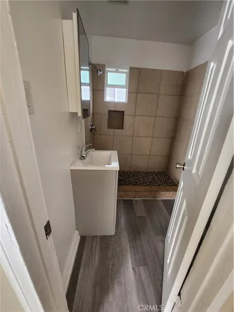 a bathroom with a sink and mirror