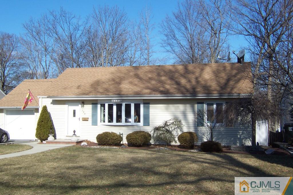 138 South Hill Road Colonia, NJ 07067 - Photo 1 of 25 a view of a car park in front of house