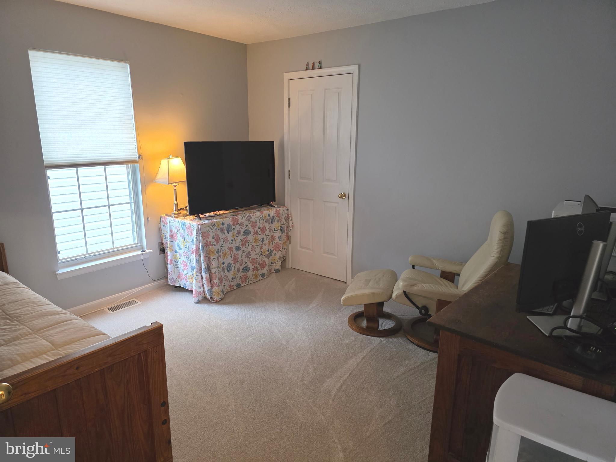 2441 Kemper Road Crofton, MD 21114 - Photo 33 of 63 a living room with furniture and a flat screen tv
