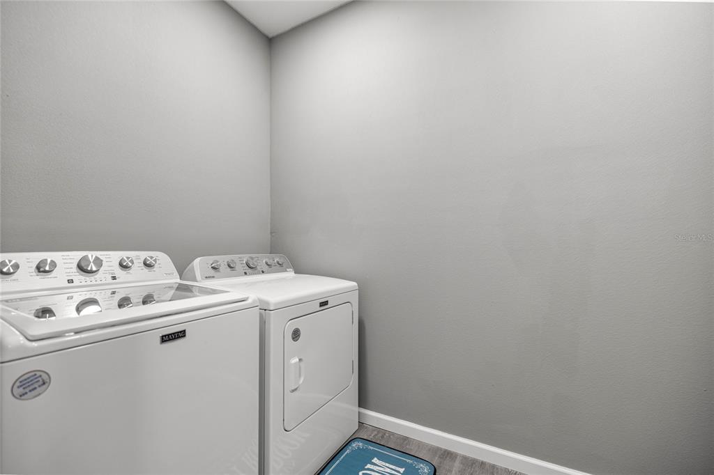15010 Northeast 3rd Place Williston, FL 32696 - Photo 22 of 32 a utility room with dryer and washer